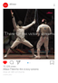 fencers in white uniforms, one with arms raised in victory