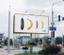 billboard advertisement for Durex featuring stylized depictions of a zucchini, banana, and chili pepper