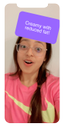 a girl in glasses presents a sign